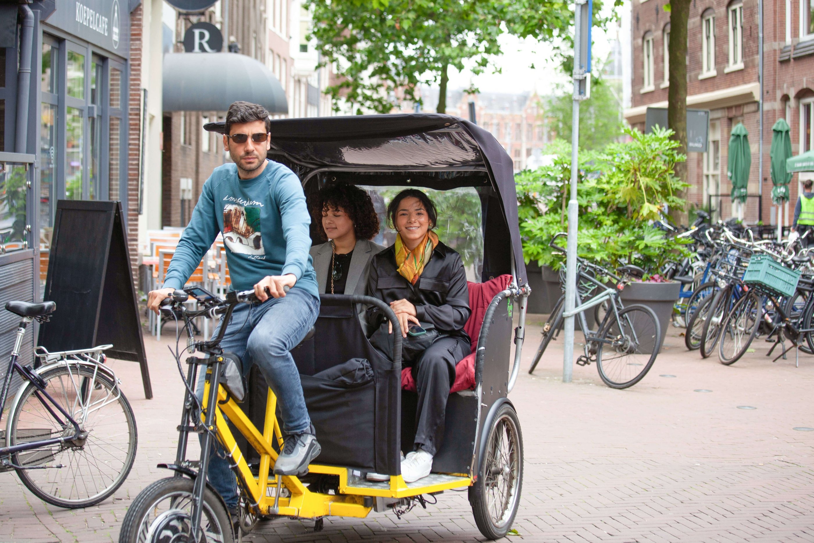 young latino ladies on bike taxi ride