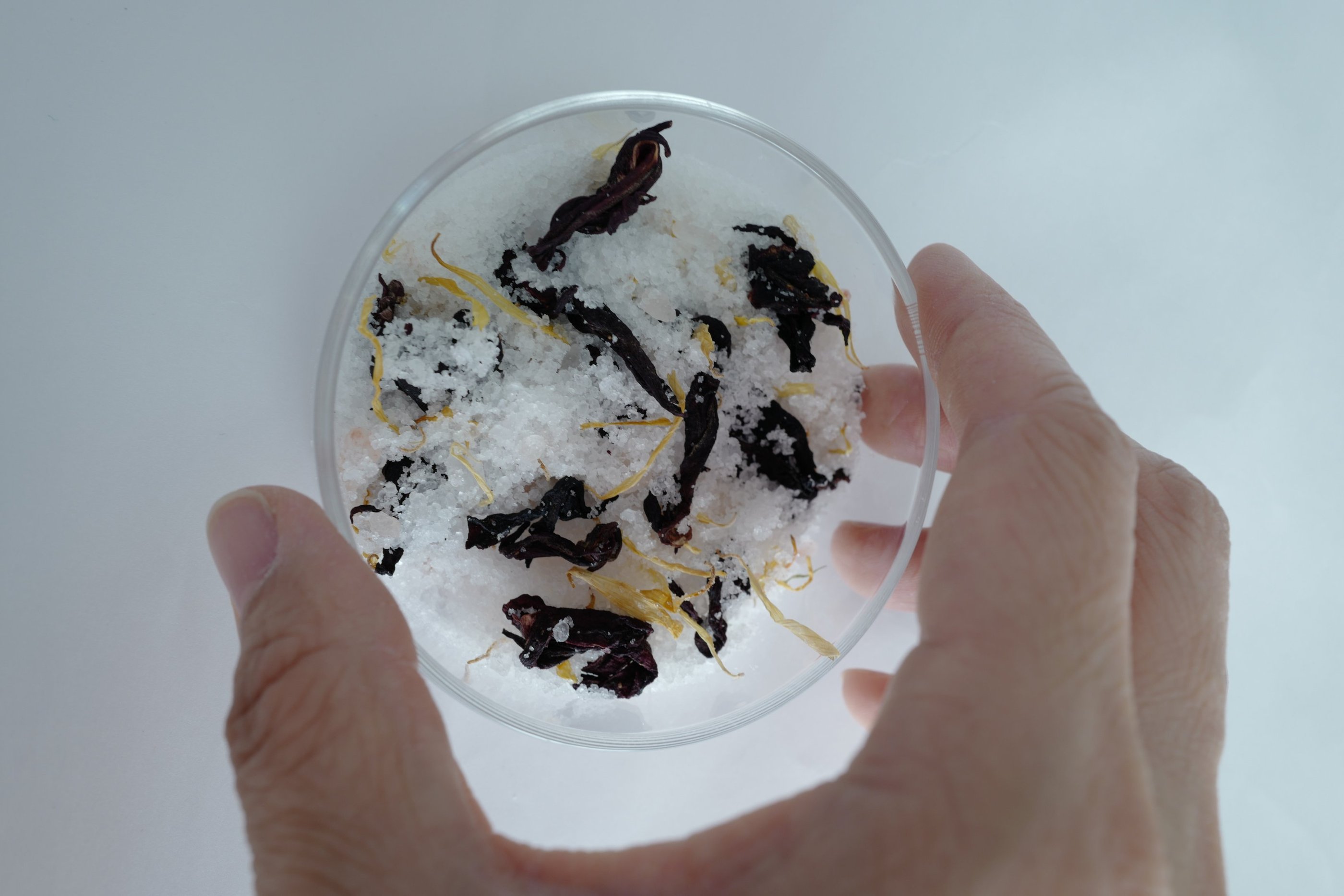 Bath salt ingredients - flowers, salt and essential oils