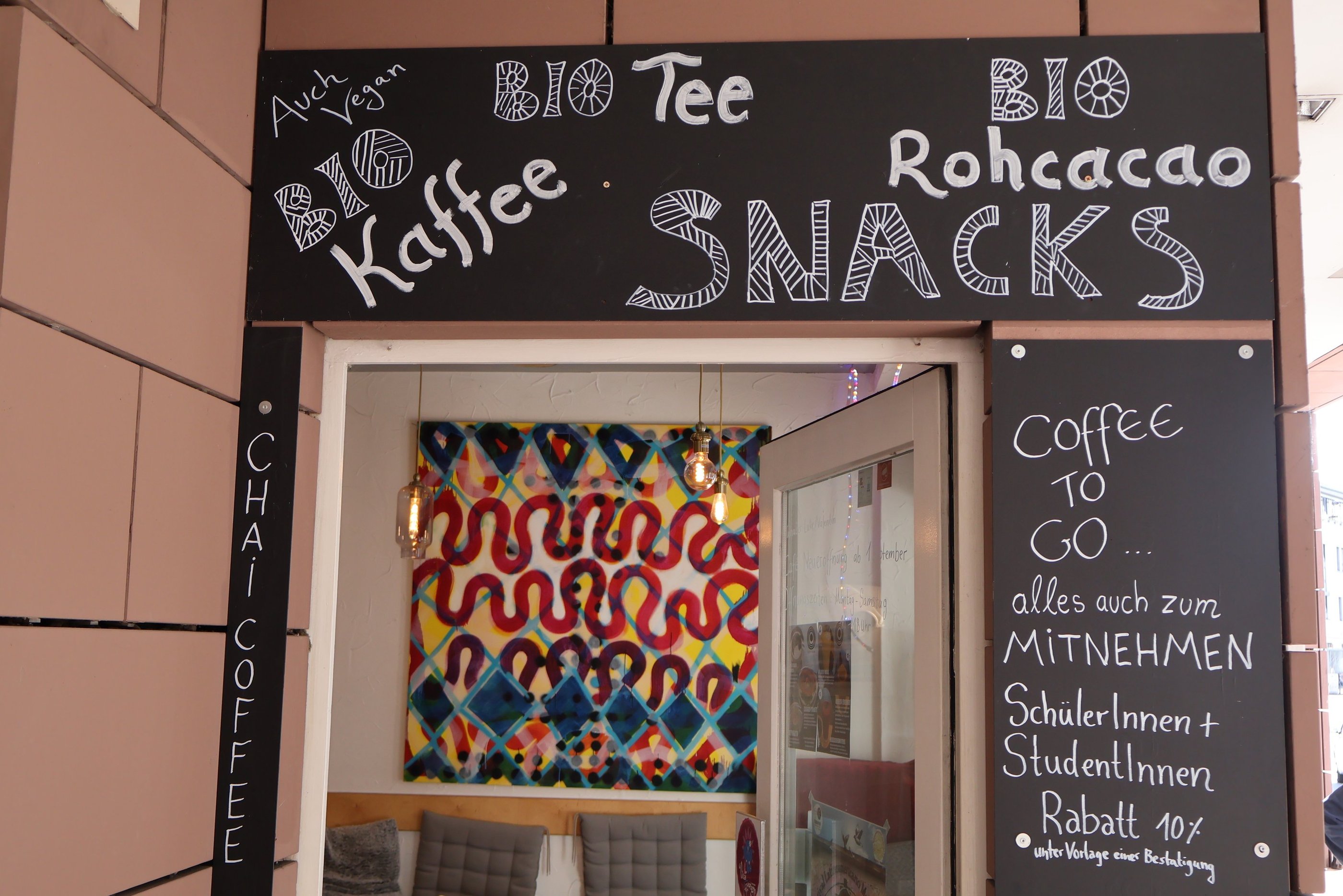 a sign that says coffee shop