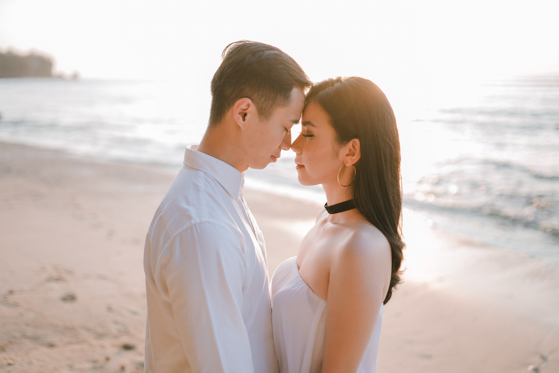 Romantic couple portrait during a proposal photography session at Anantara Uluwatu Bali Resort.