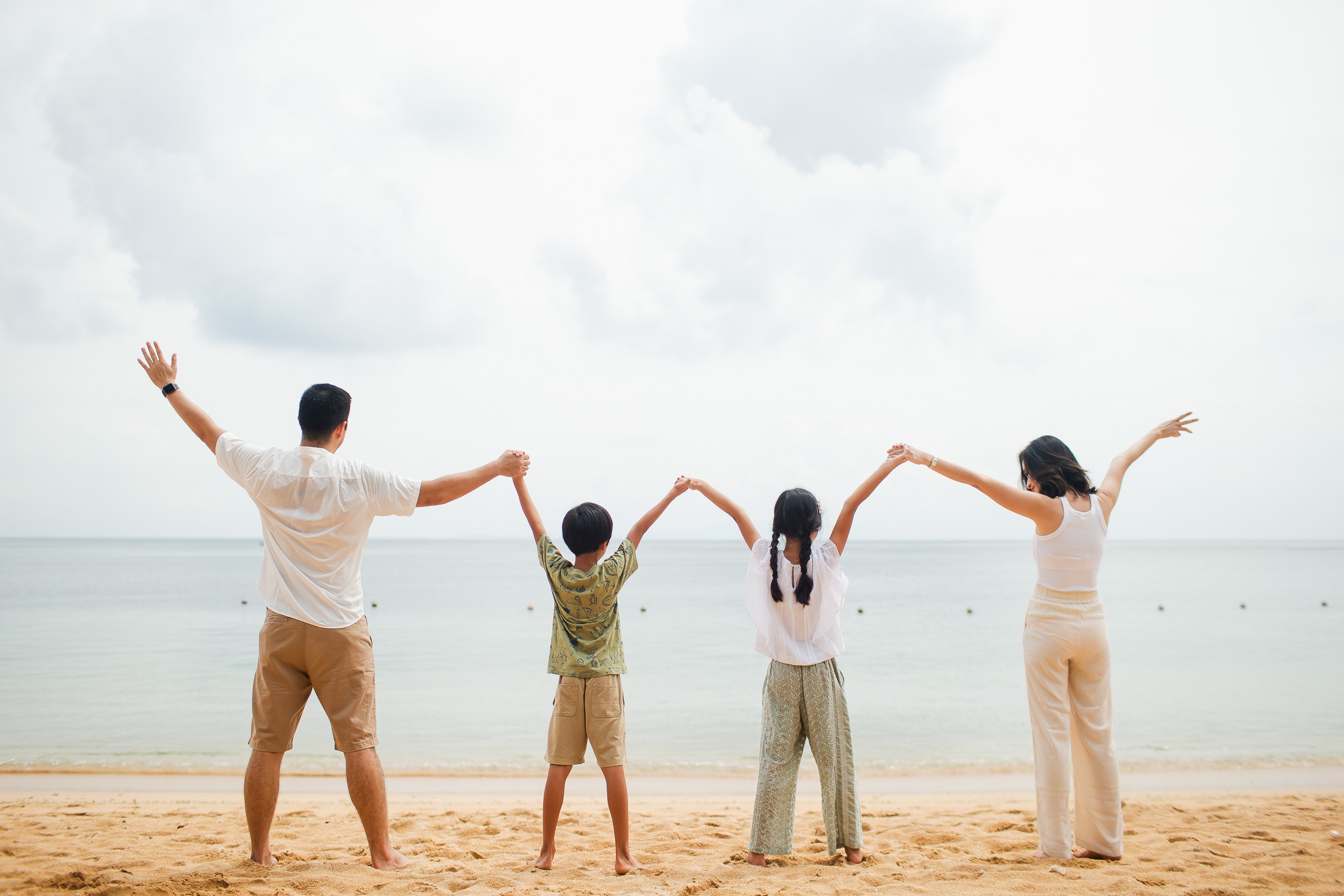 family enjoying fun moments at the beach in Westin Nusa Dua Bali session