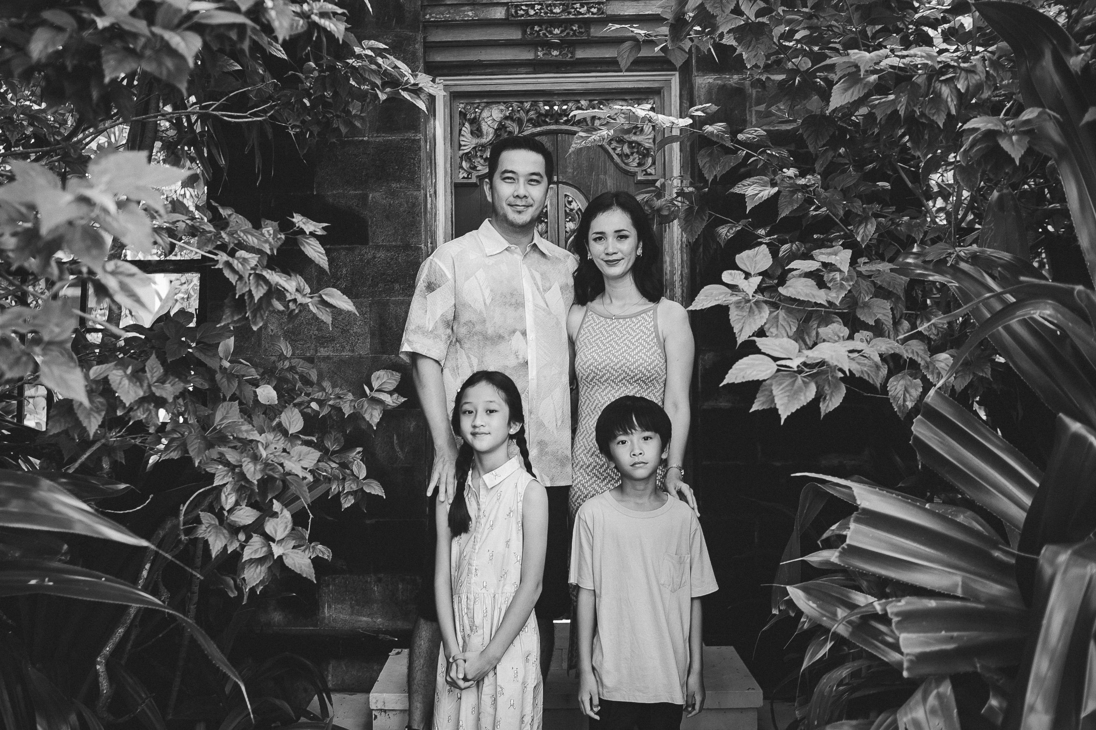 black and white family portrait at Westin Nusa Dua Bali with natural storytelling style