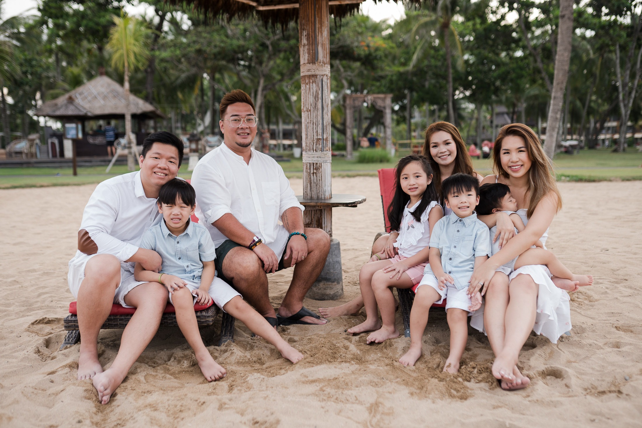 Large family portrait during a destination family photography session at The Laguna Bali