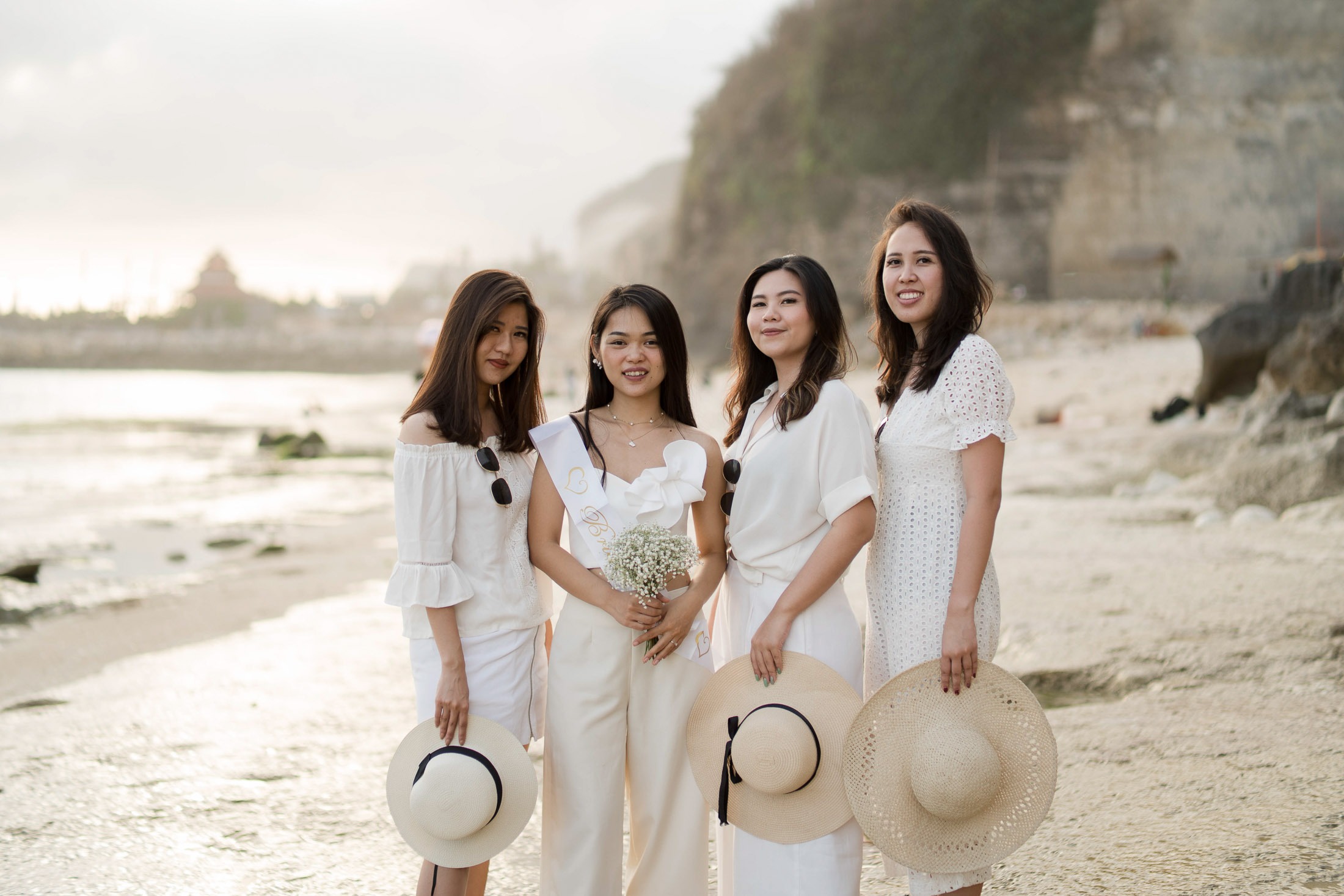 Bridal party bride tribe portrait during sunset at Melasti Beach Bali