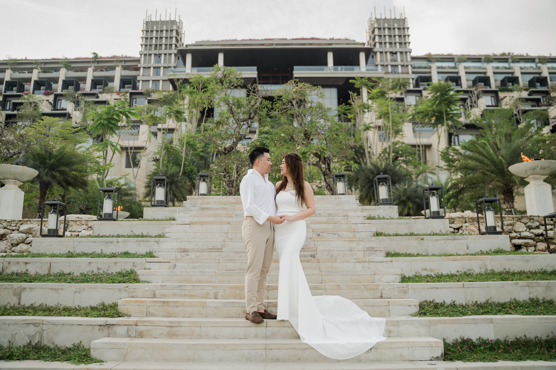 Couple portrait with the iconic architecture of Apurva Kempinski Bali resort during a prewedding photoshoot