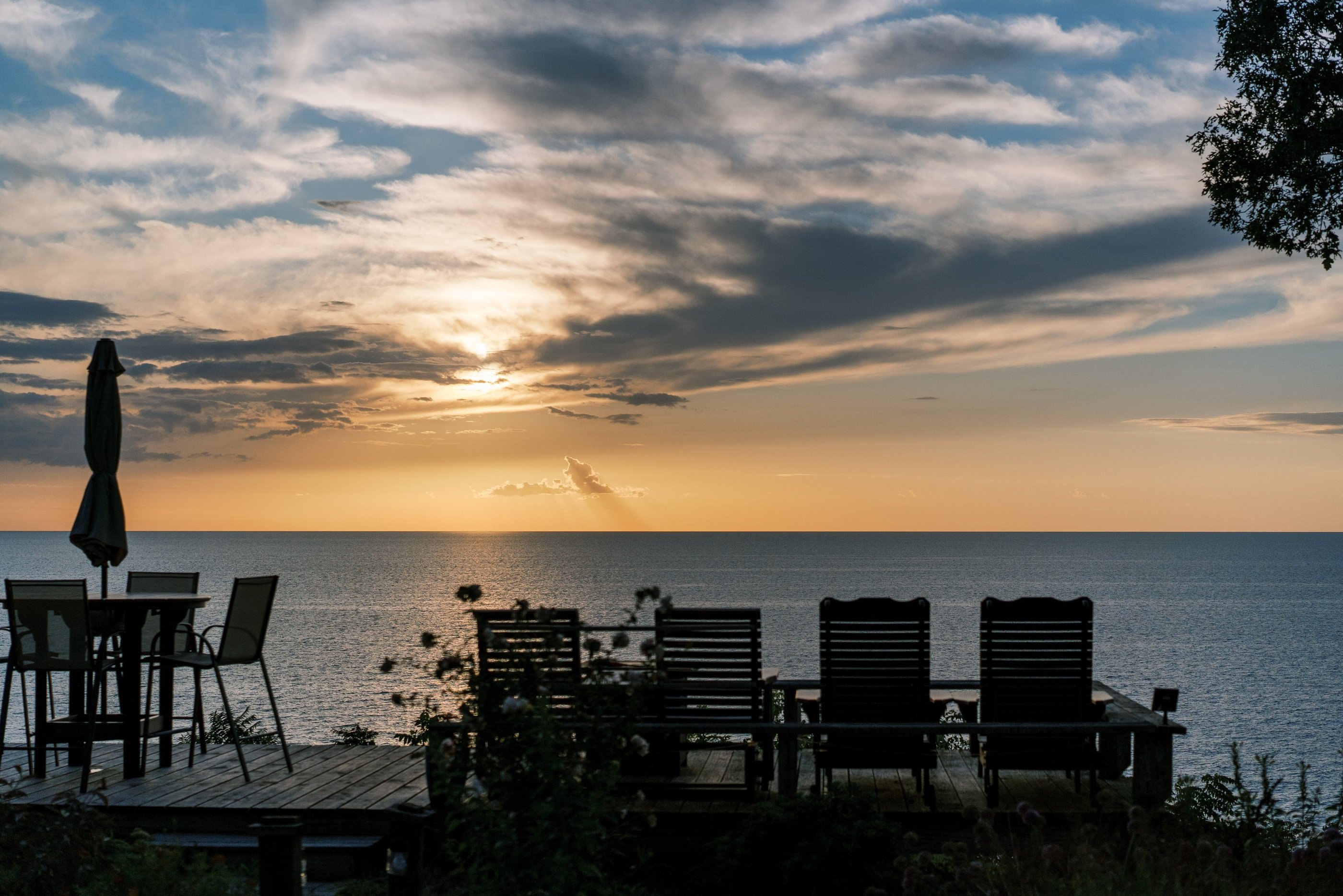 Sunset over Lake Michigan from the South Cliff Inn's Sunset Deck