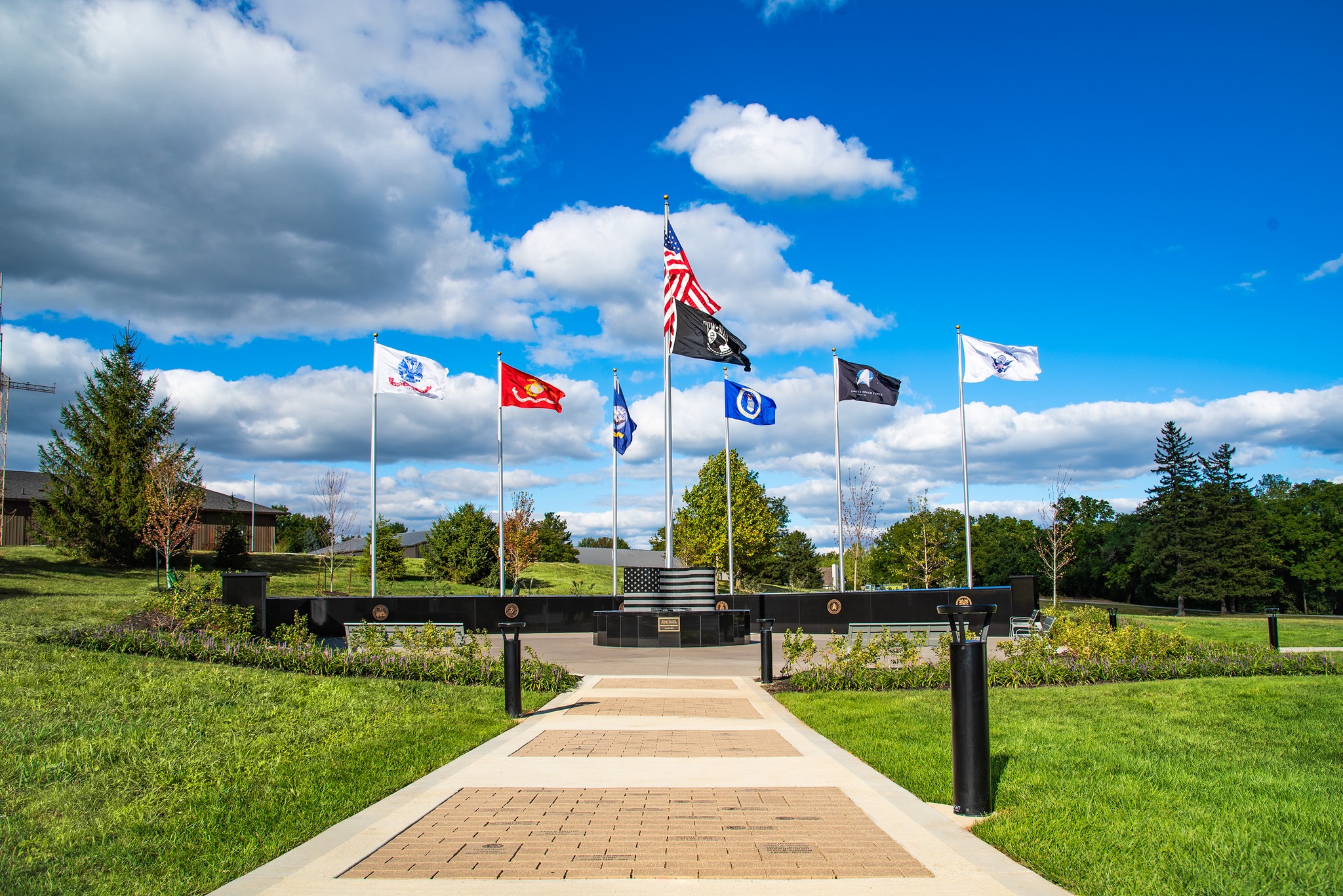 A MEMORIAL WALKWAY WITH FLAGS IN LEWIS CENTER, OH