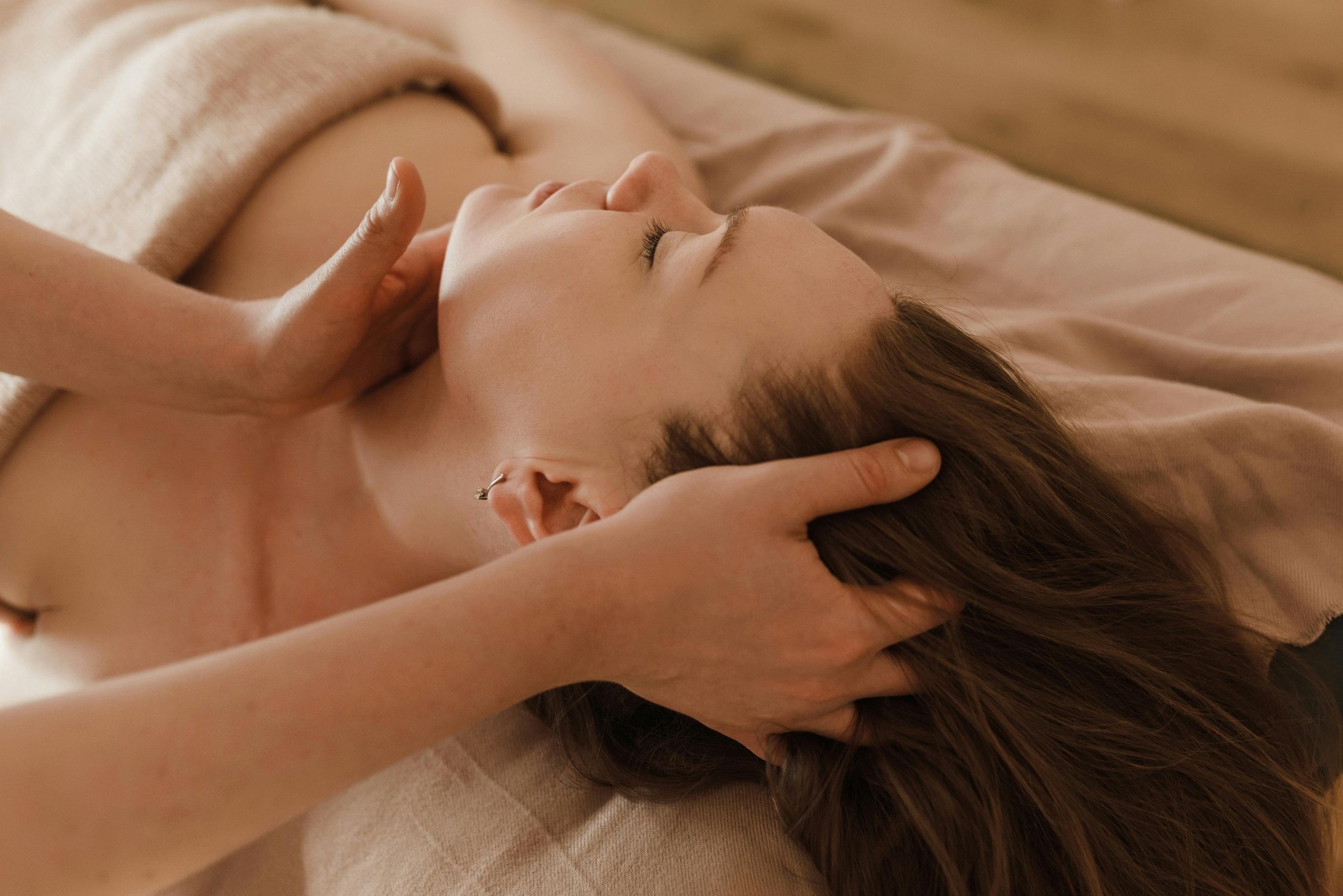 women with a facial massage