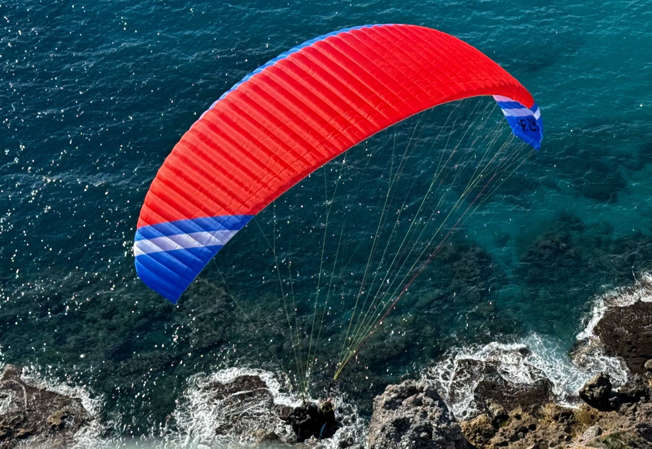  wefly tandem paraglider over sea