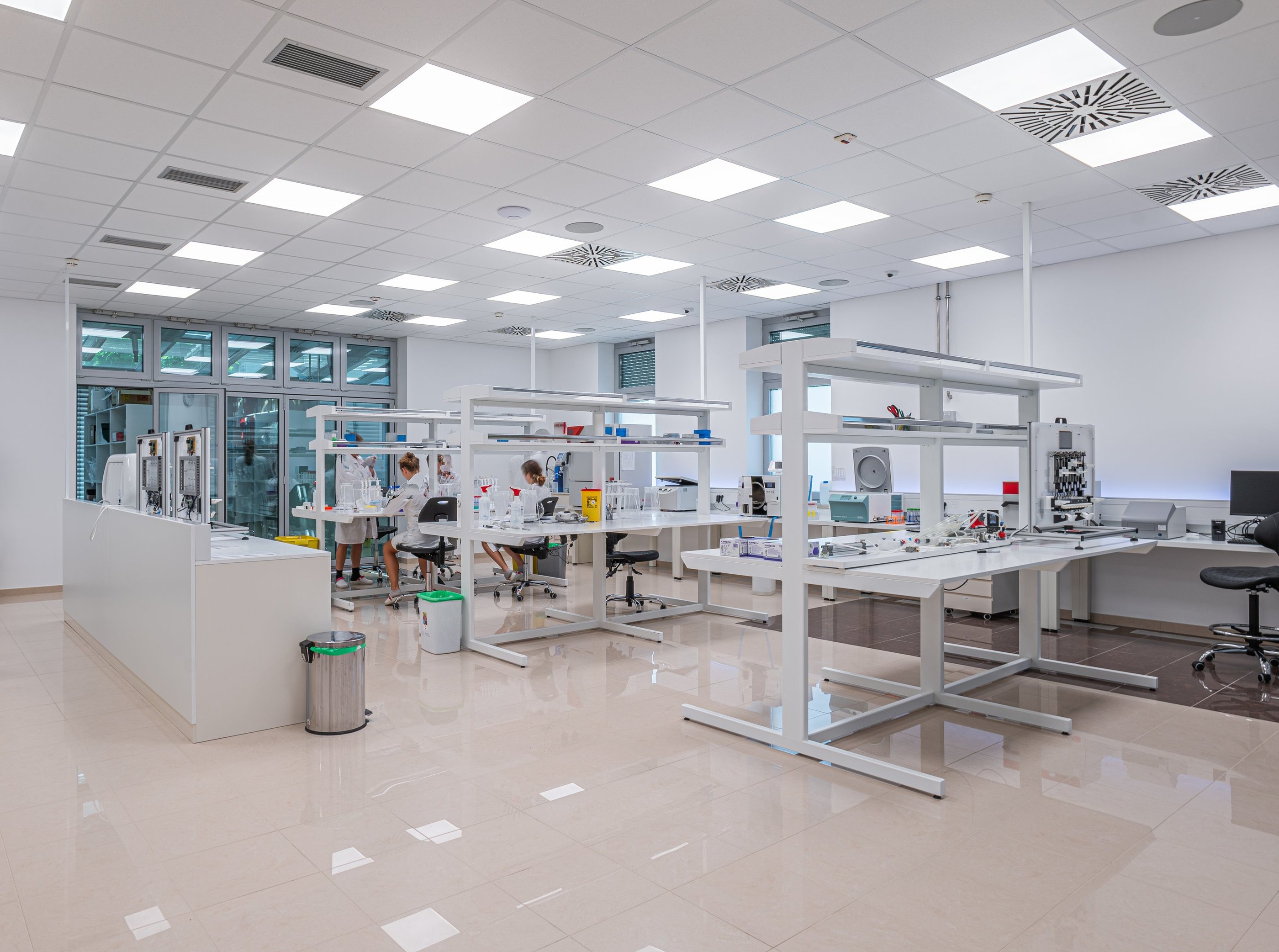 a lab with a lot of work in the background