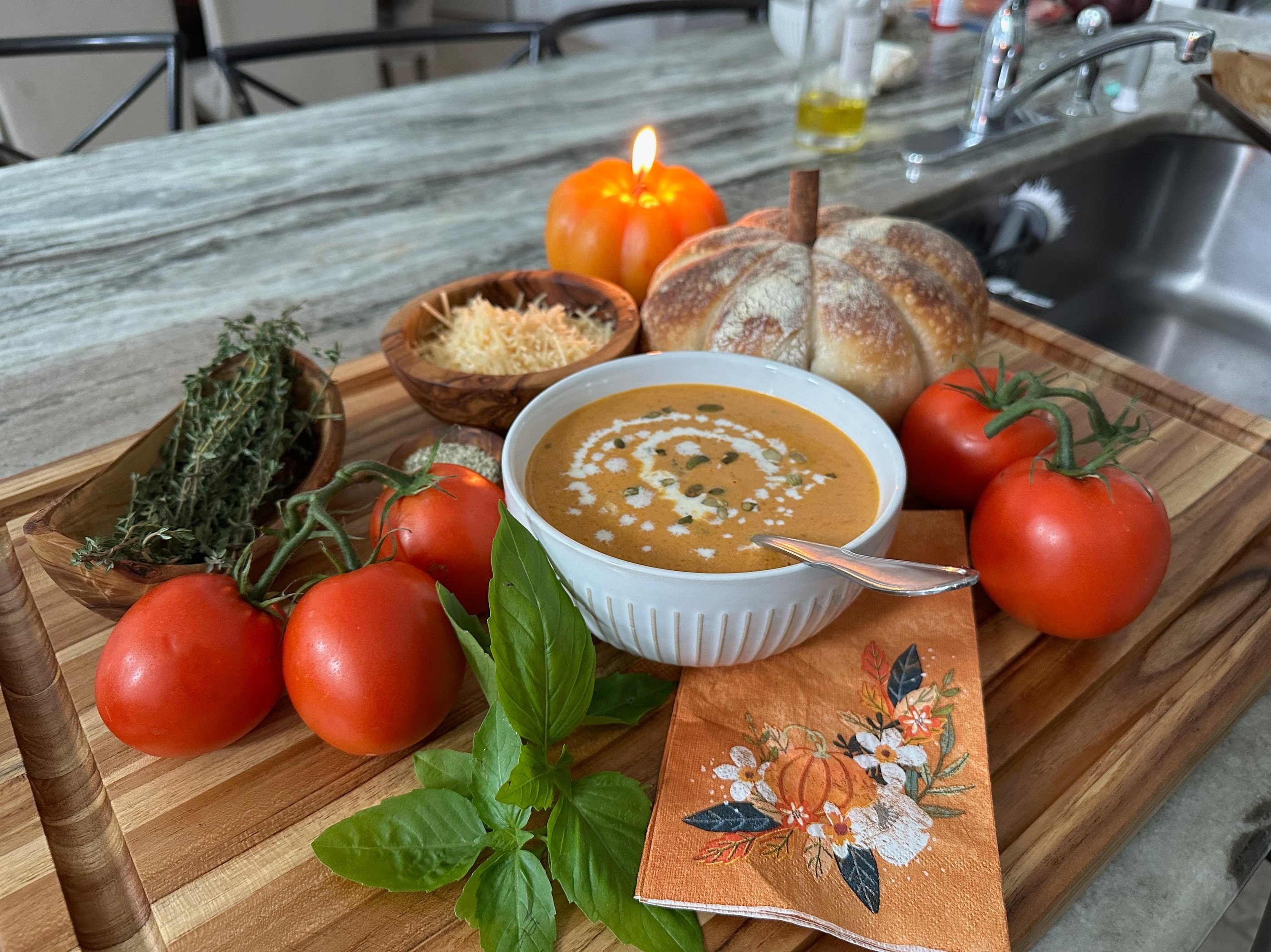 Creamy pumpkin soup with pumpkin shaped sourdough bread