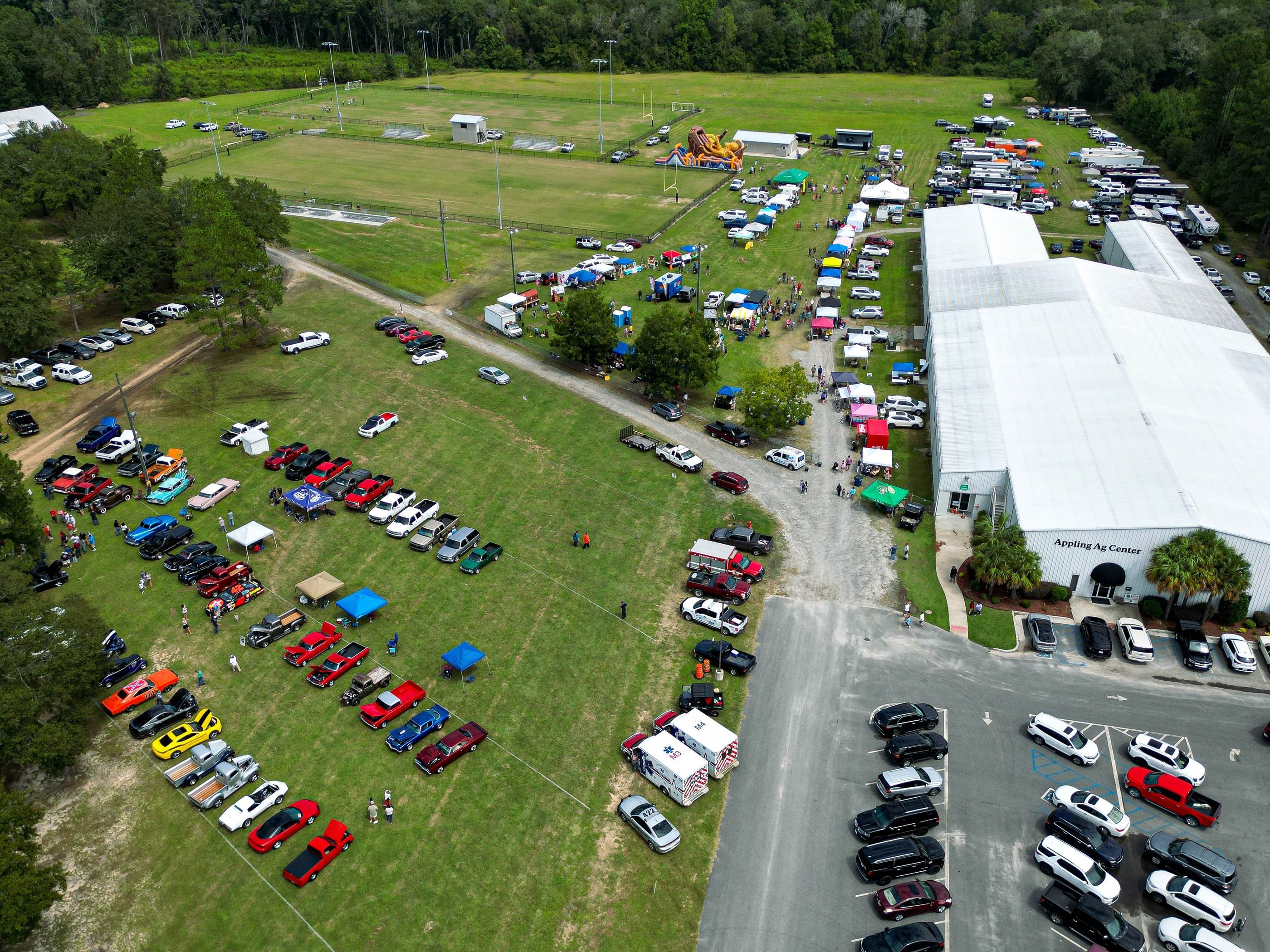 a large field with many cars parked in it