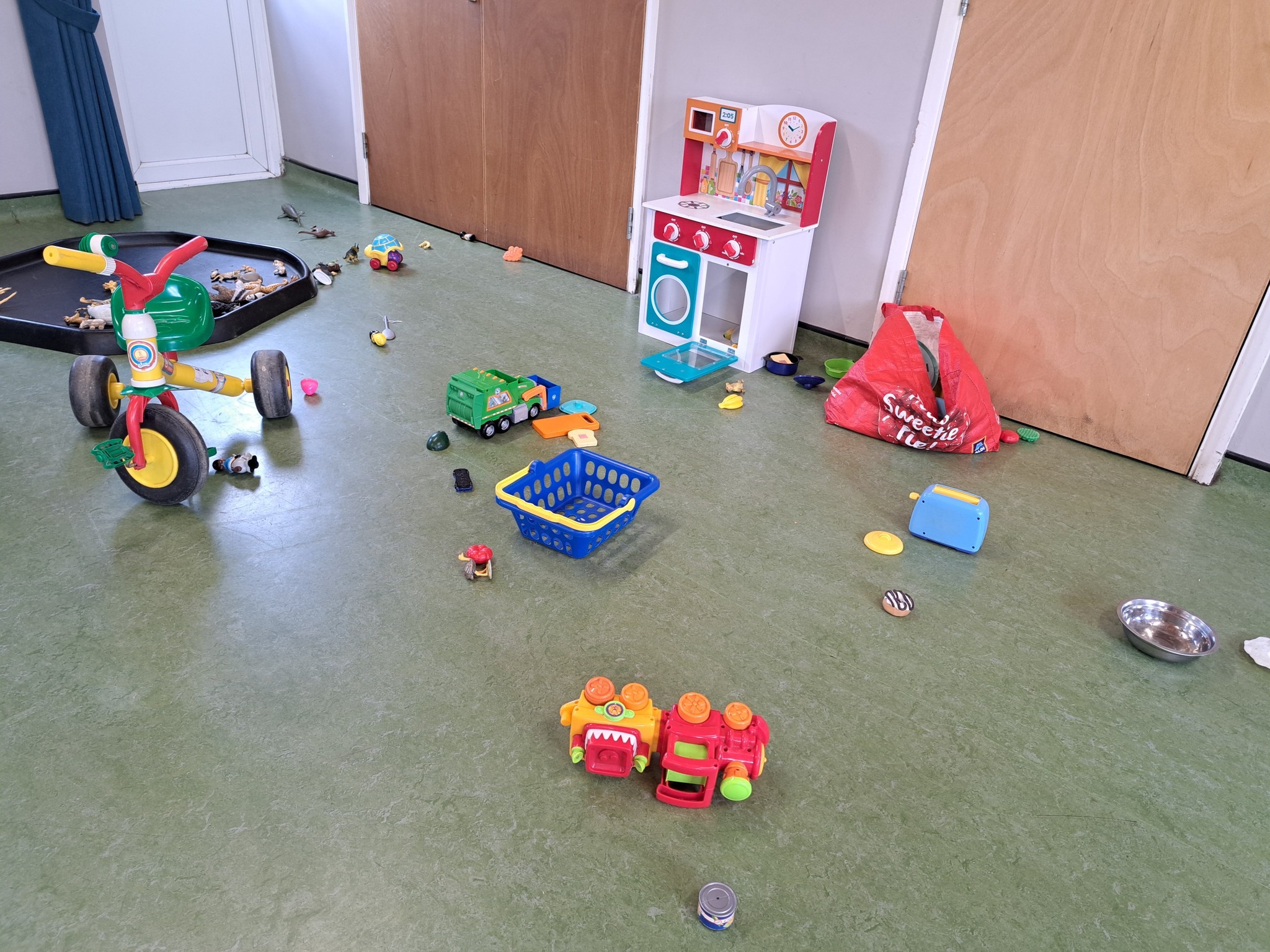 Toys set up inside Elsenham Memorial Hall for Little Fishies toddler group session.