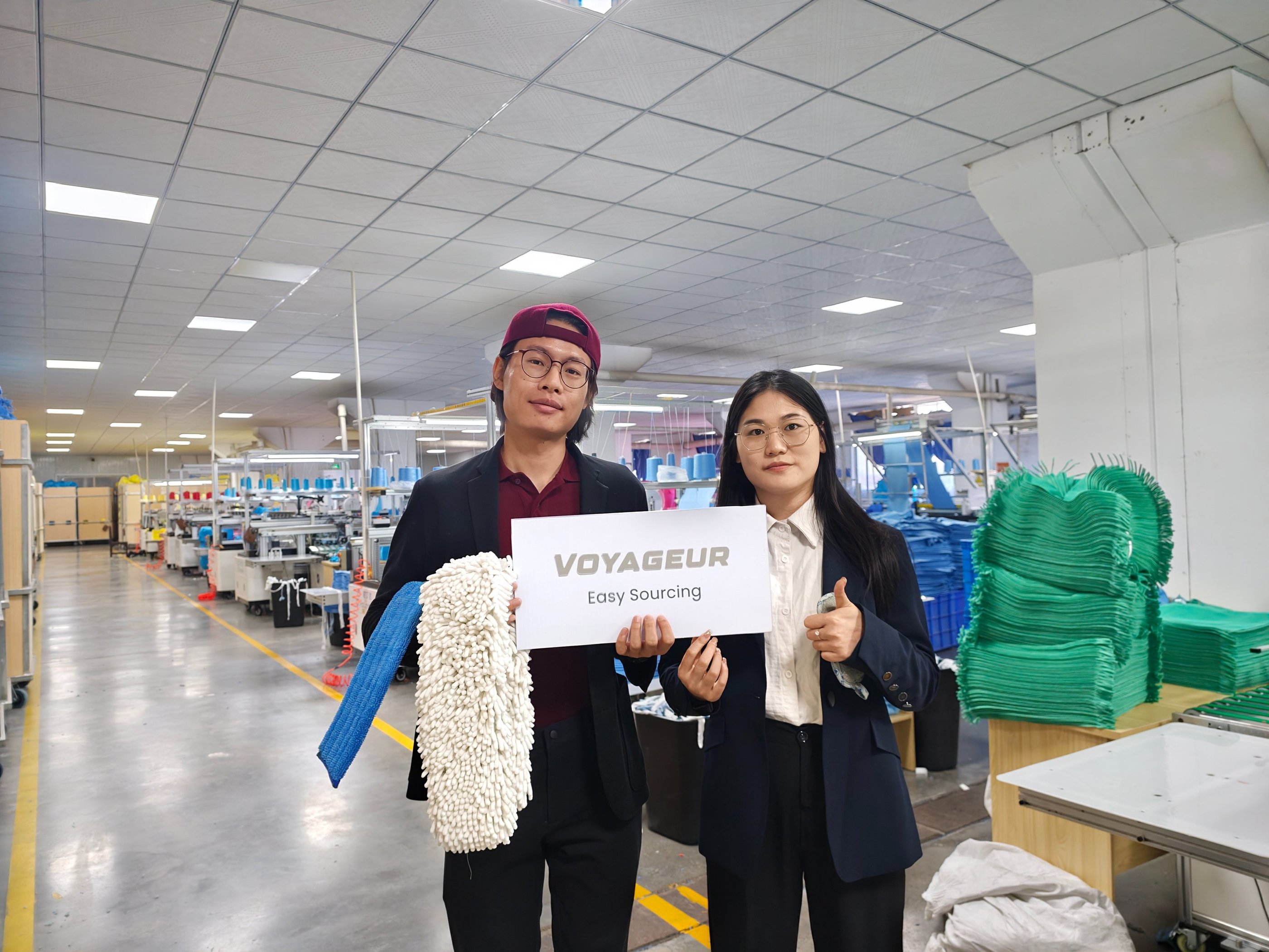 Sourcing agent inspecting a microfiber factory in Foshan, China