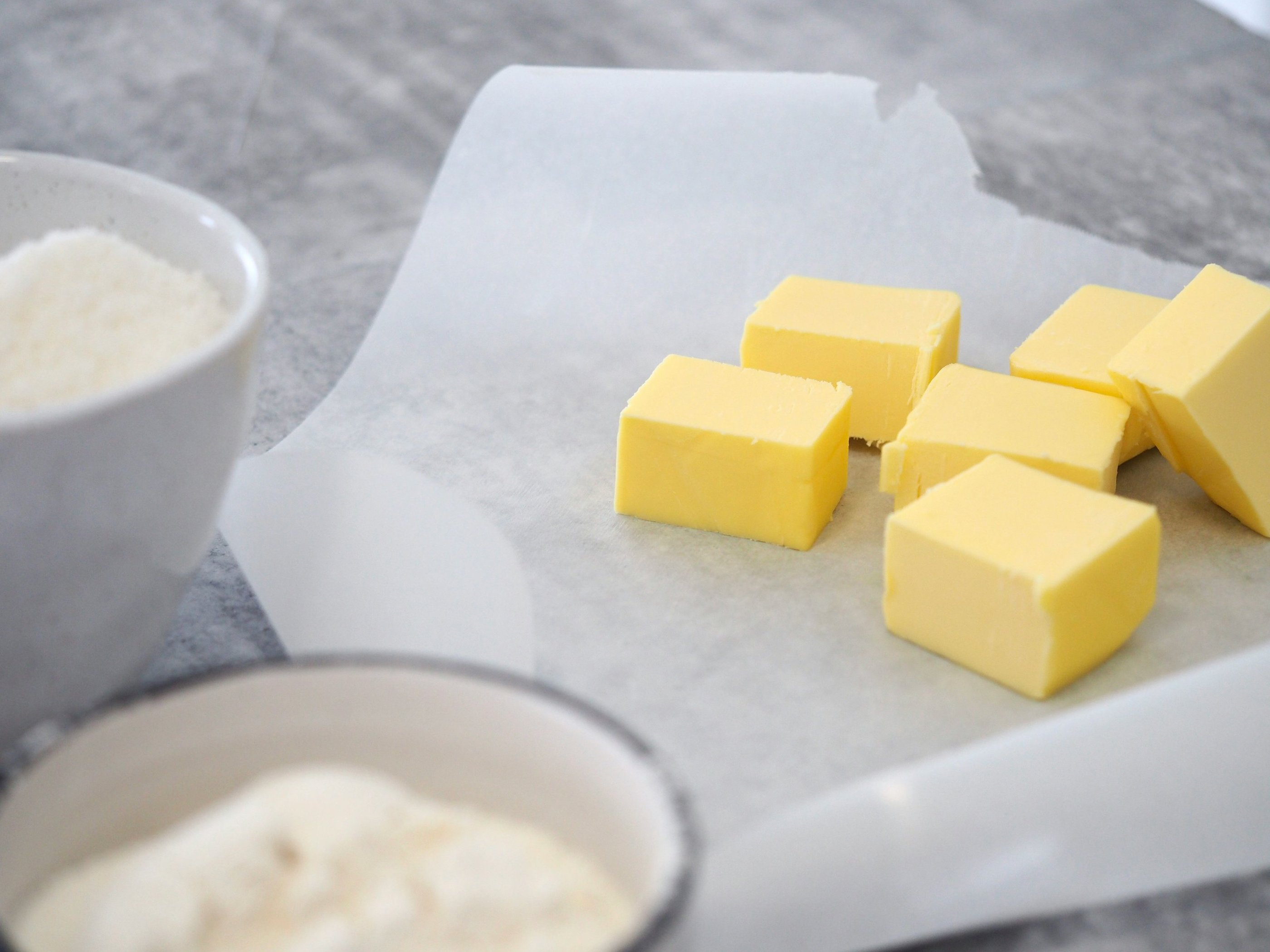 a bunch of butter butter cubes on a table