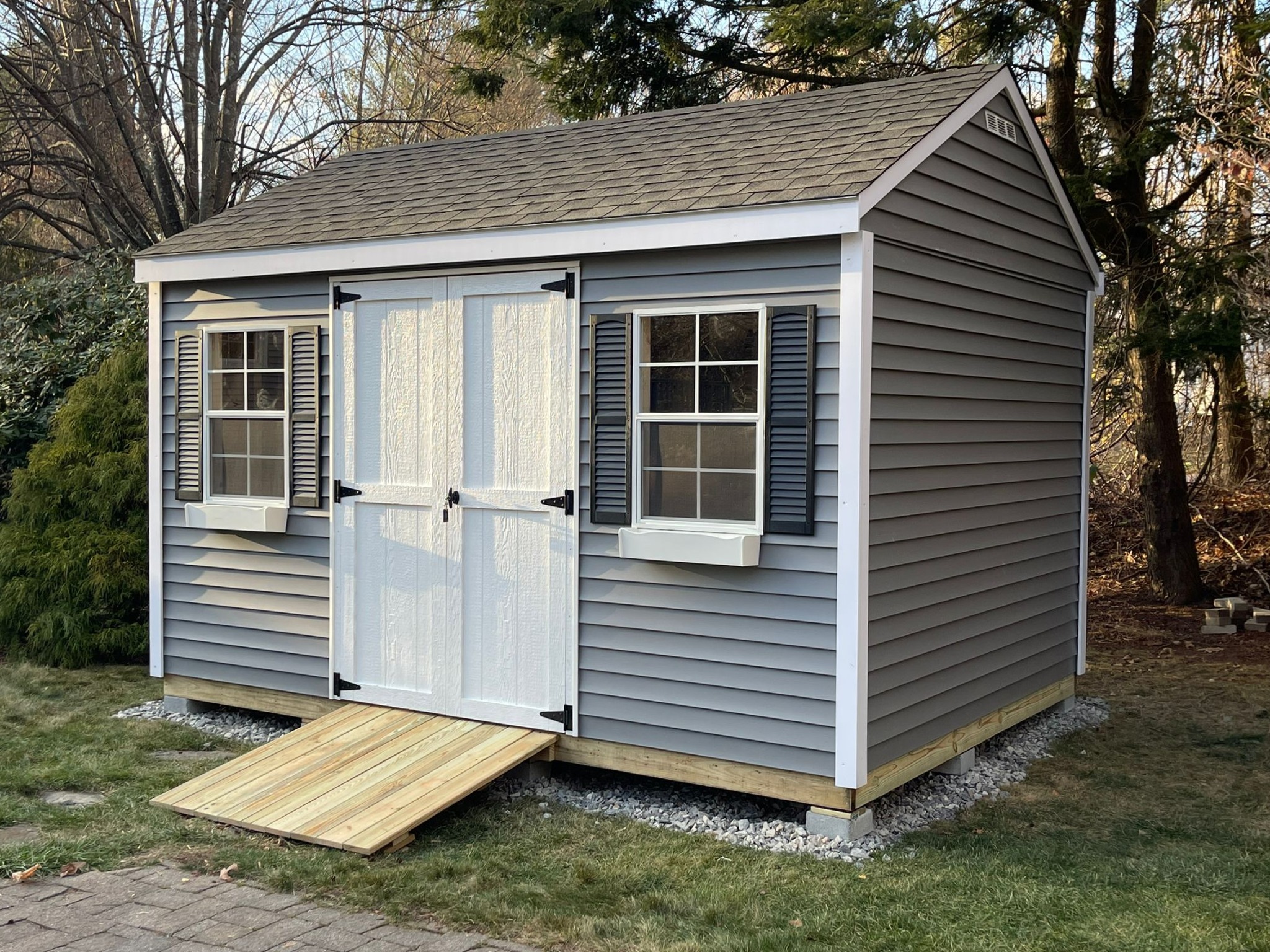 Standard pressure treated shed ramp built in Rhode Island for easy entry and accessibility.