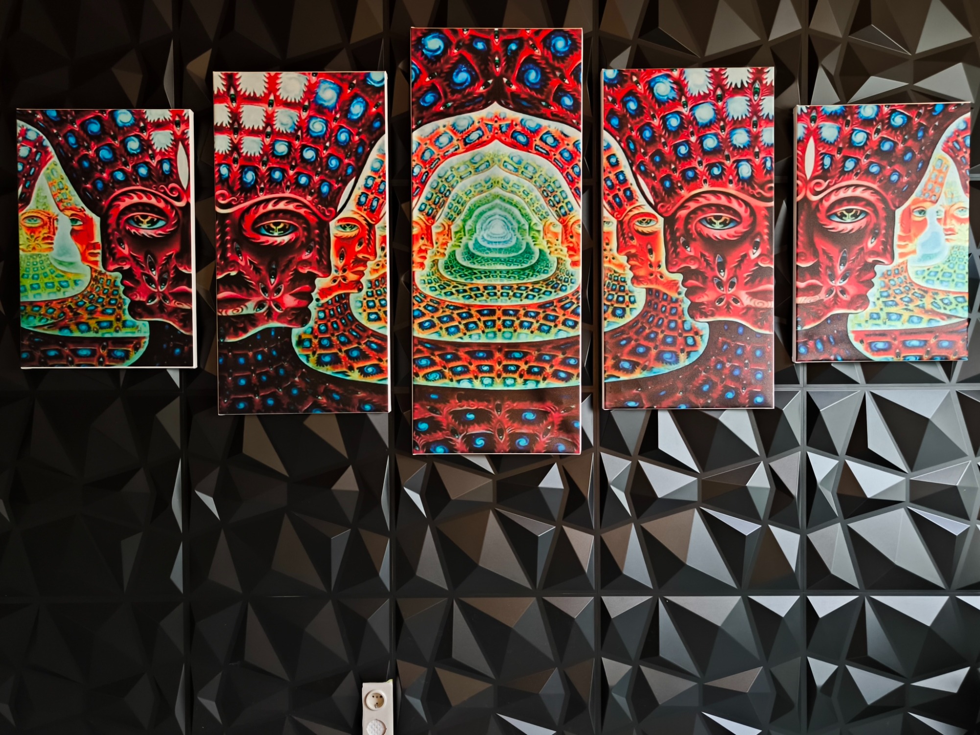 a group of four paintings of a man with a cat