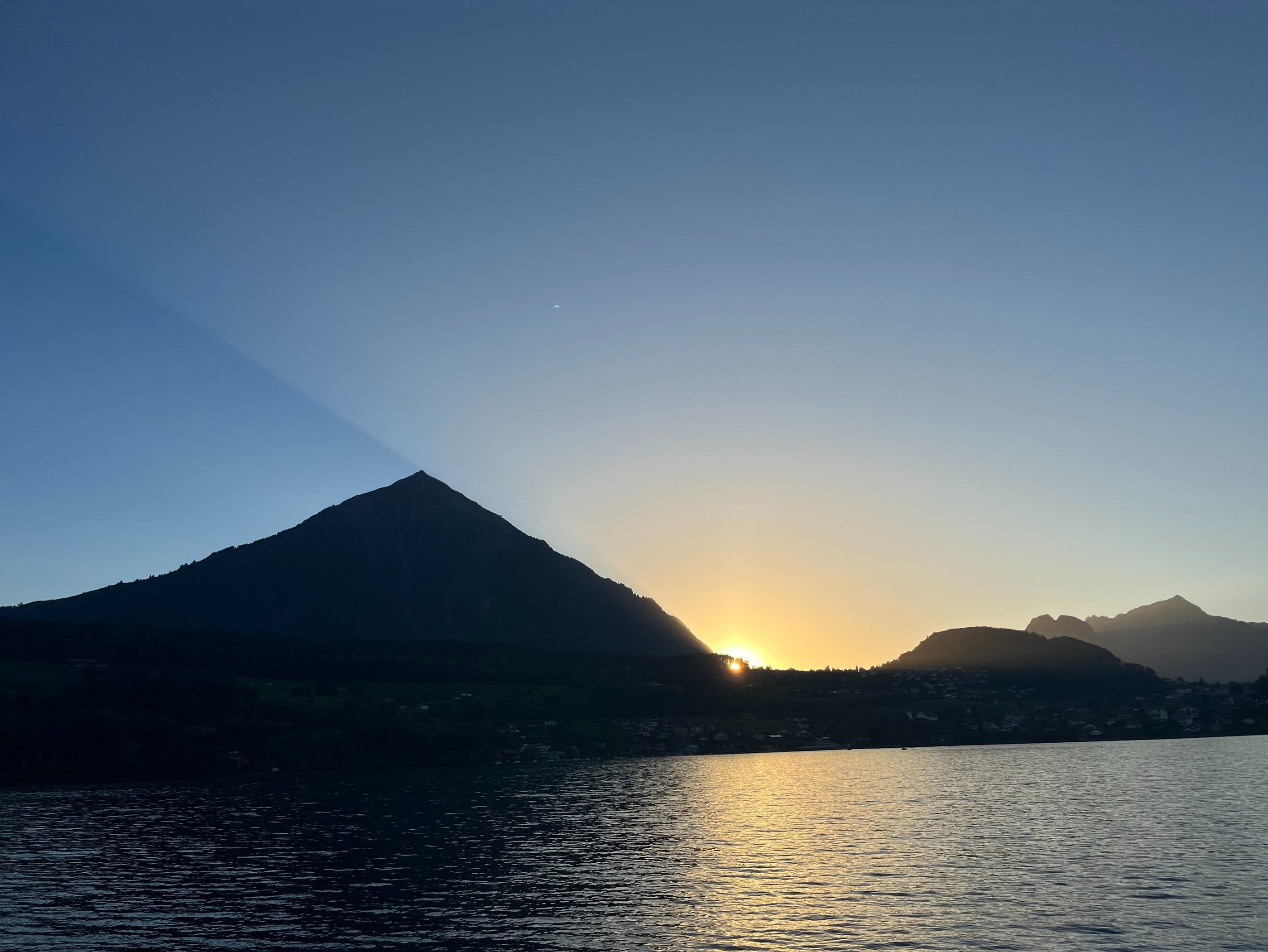 Niesen casting a shadow over Lake Thun