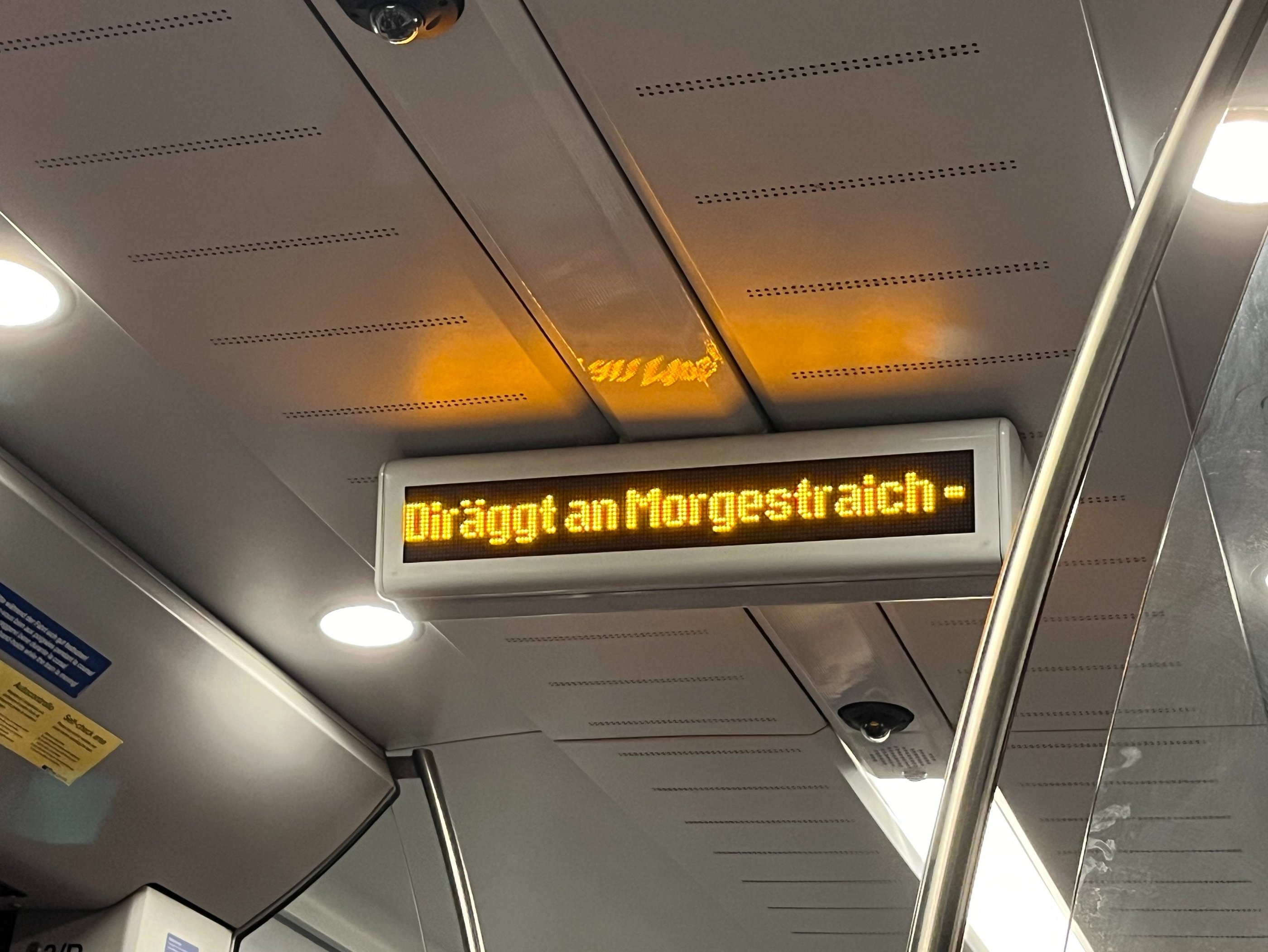 A sign on the train to Basel Switzerland saying Diraggt an Morgestraich