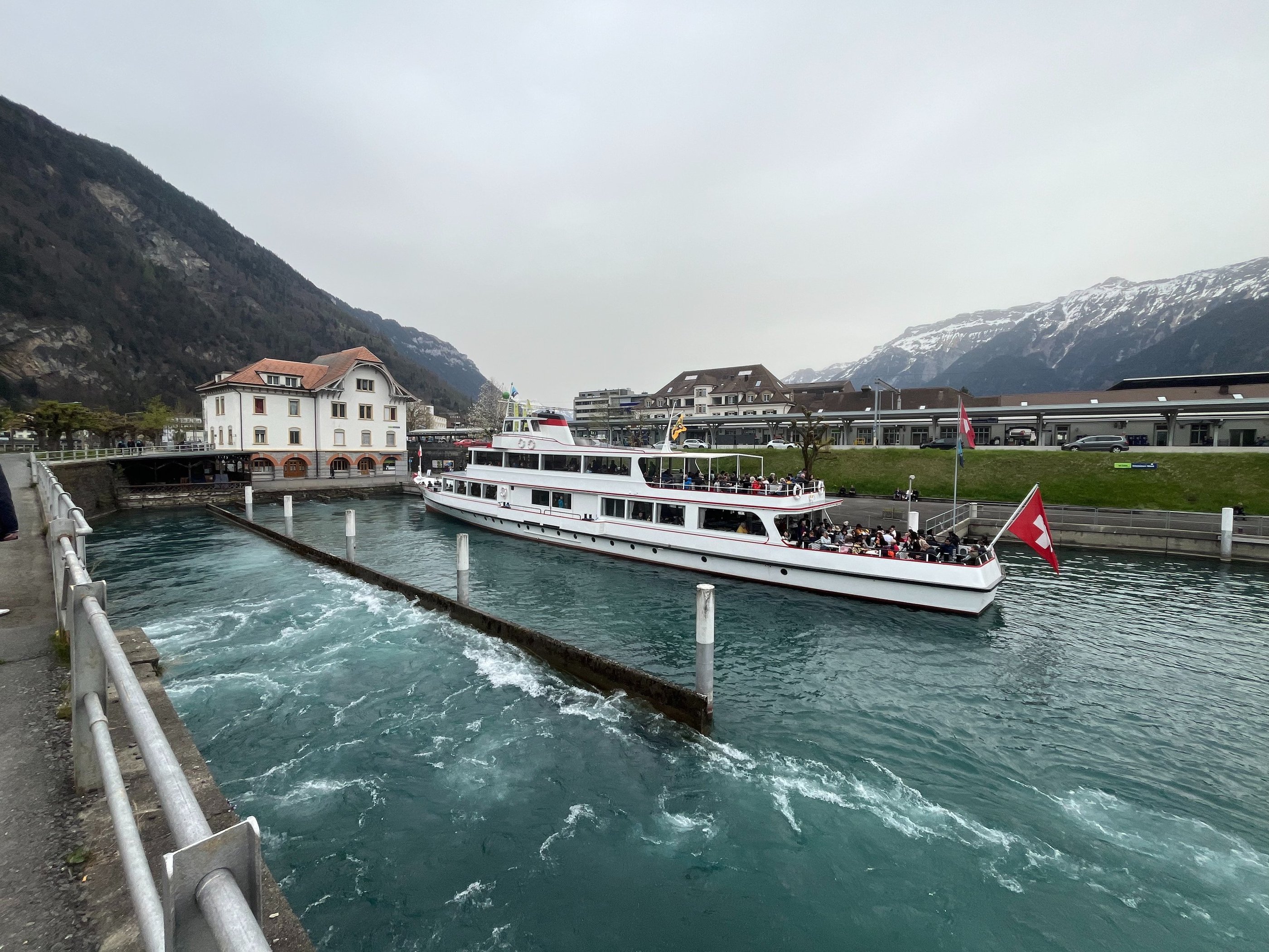 View of the end of the Interlaken Ship Canal with the Motor Vessel Beatus loading passengers.