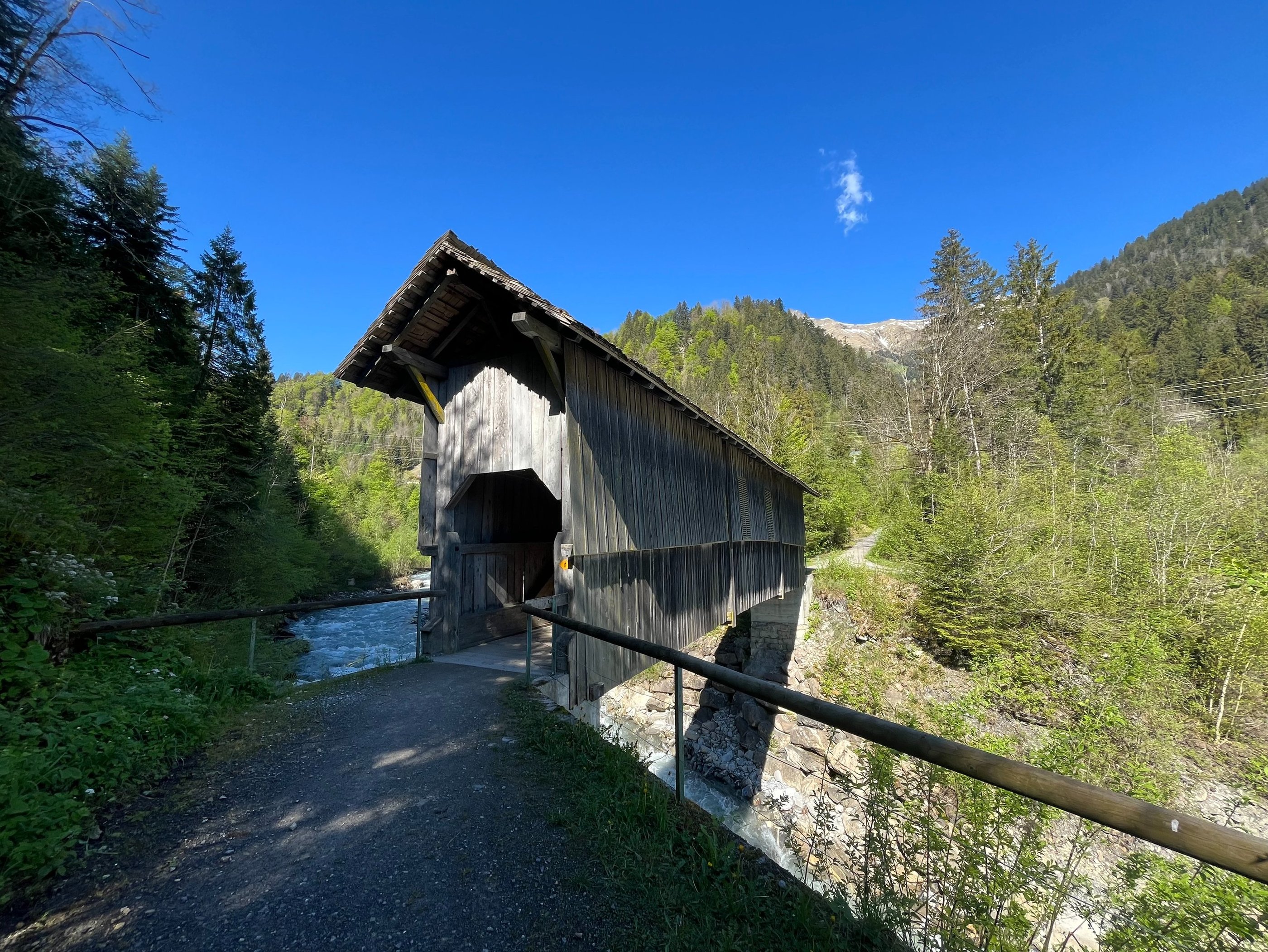 A covered bridge over the Entschlige River outside of Frutigen