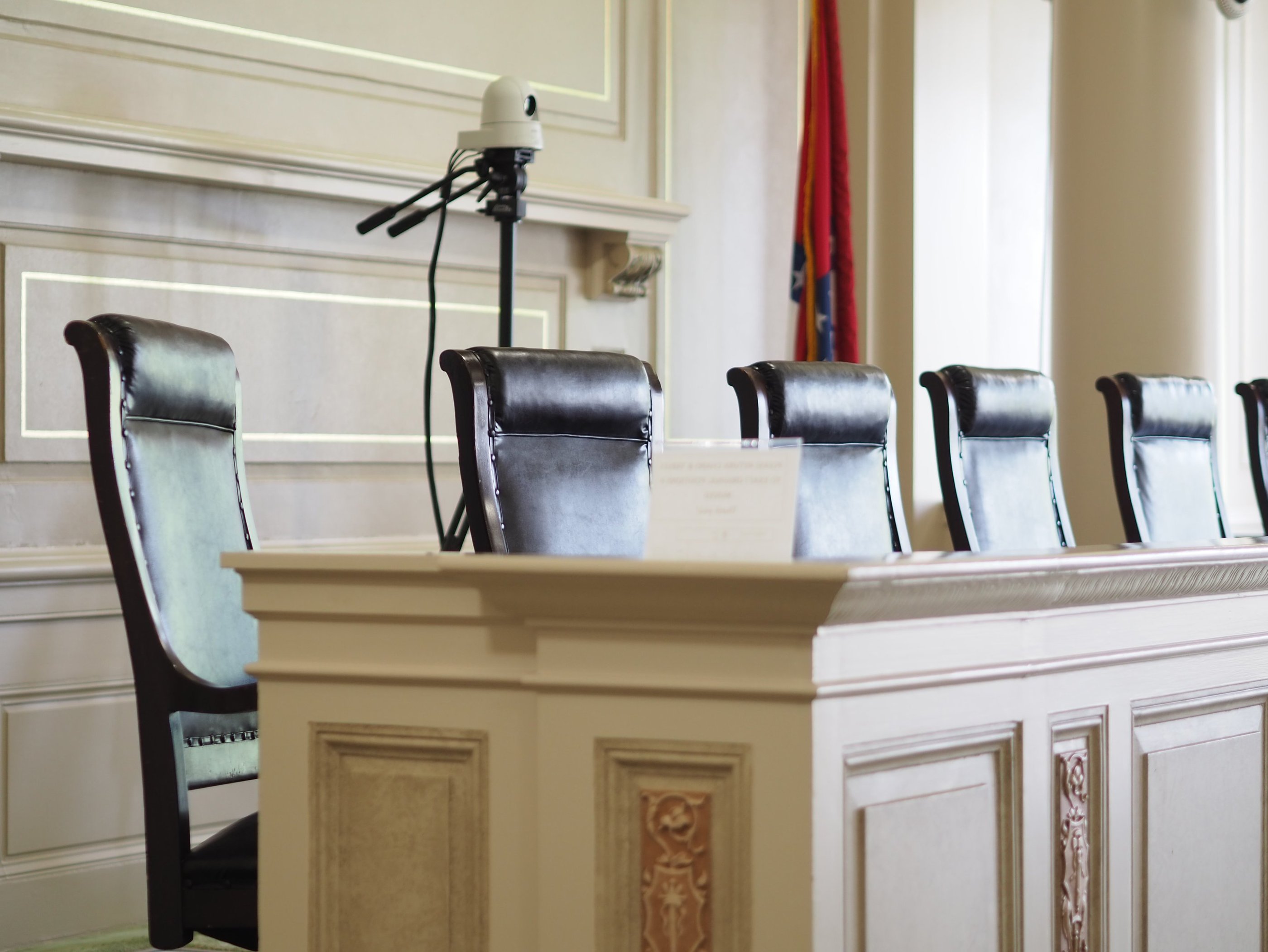 Arkansas Historic Supreme Court seats sit empty. This courthouse was established in 1836.