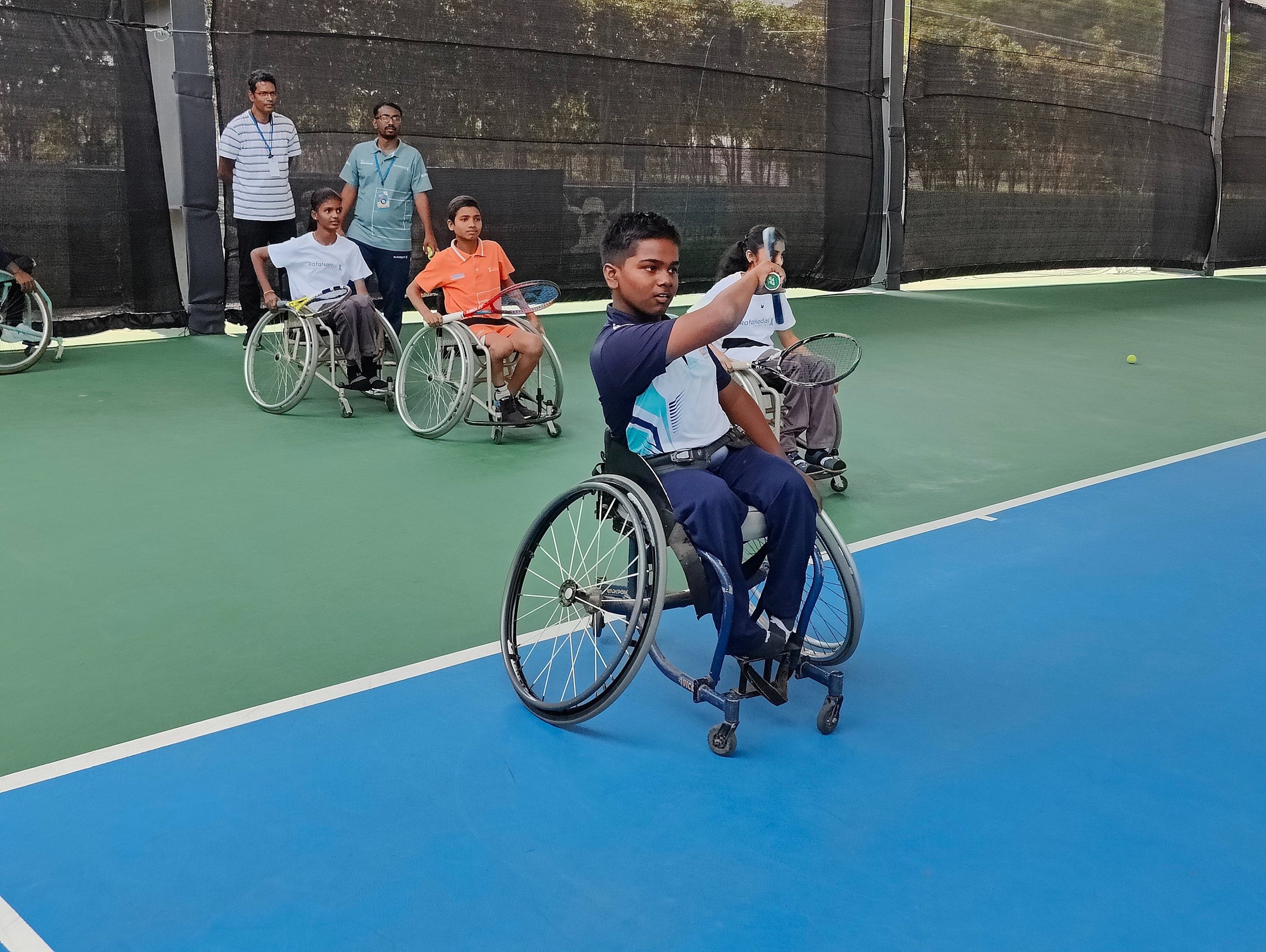Wheelchair tennis athlete with Cesar Performance Coach