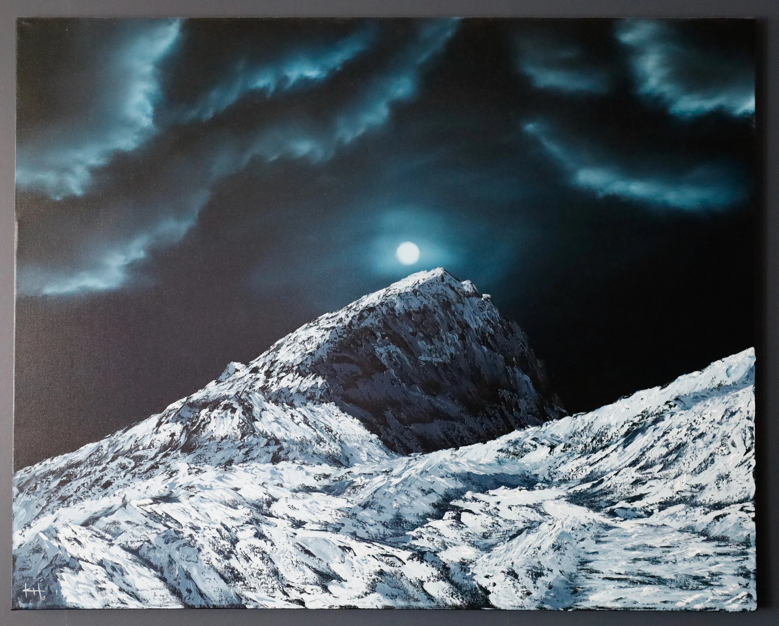 a mountain scene with a moon and a full moon