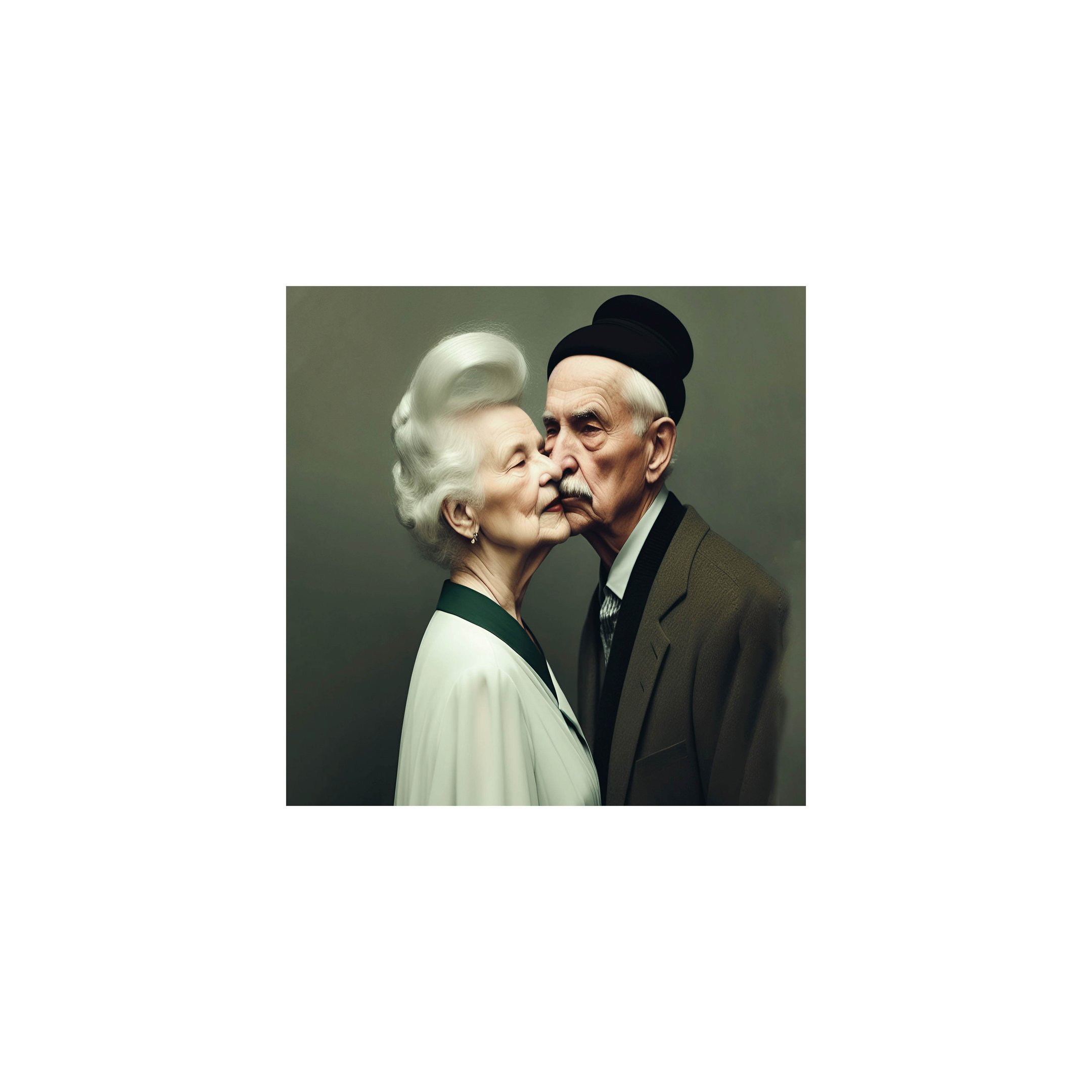 a man and woman kissing in front of a gray background