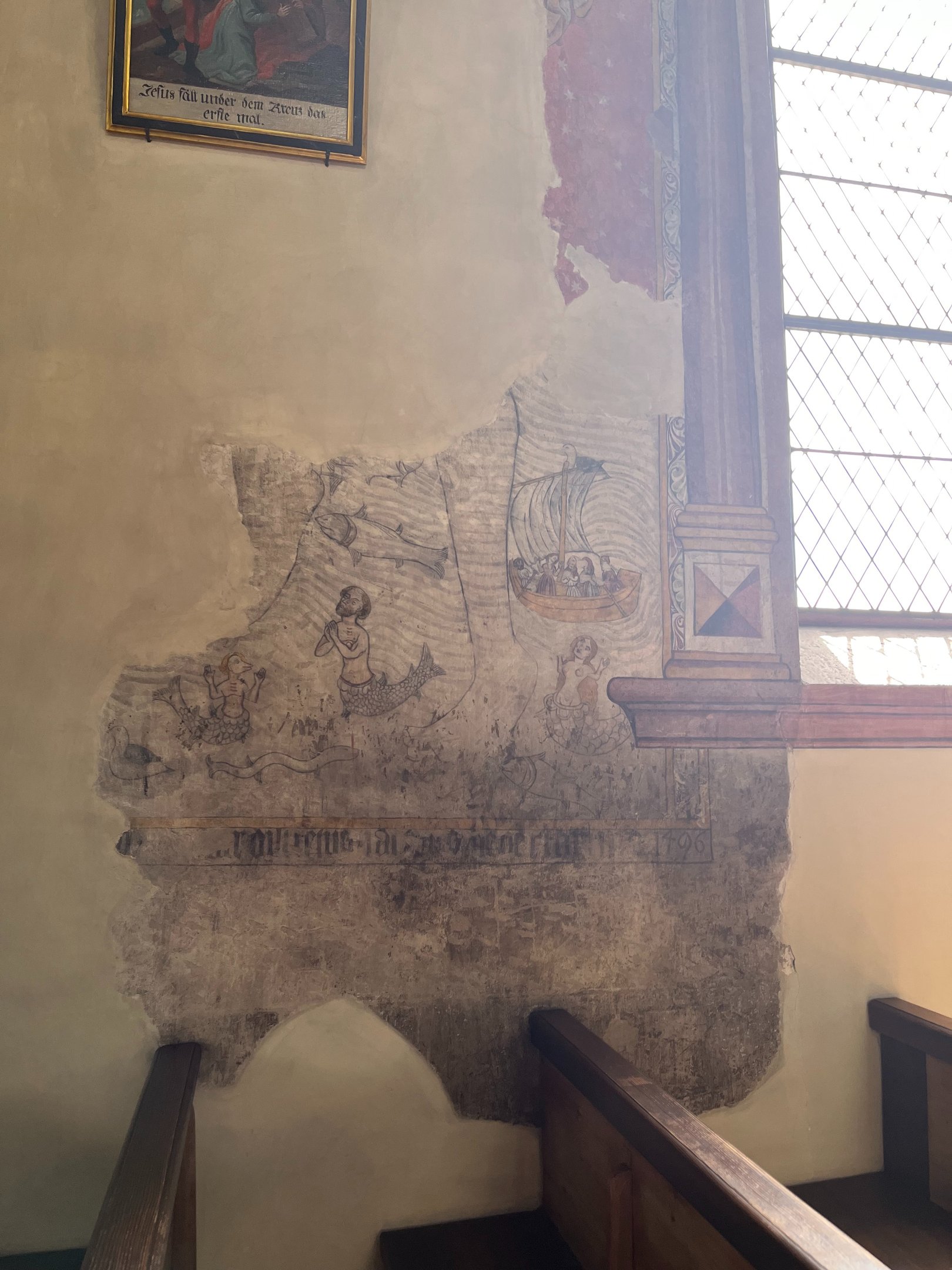 Mermaids in the frescos on the walls of the church in Leuk Switzerland