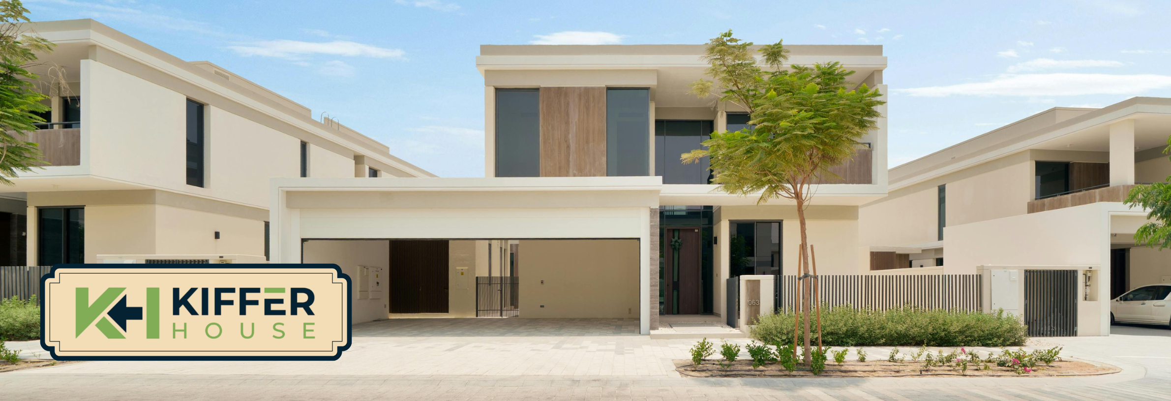 modern logo architects villa with minimalist architecture, flat roof, and two-car garage.