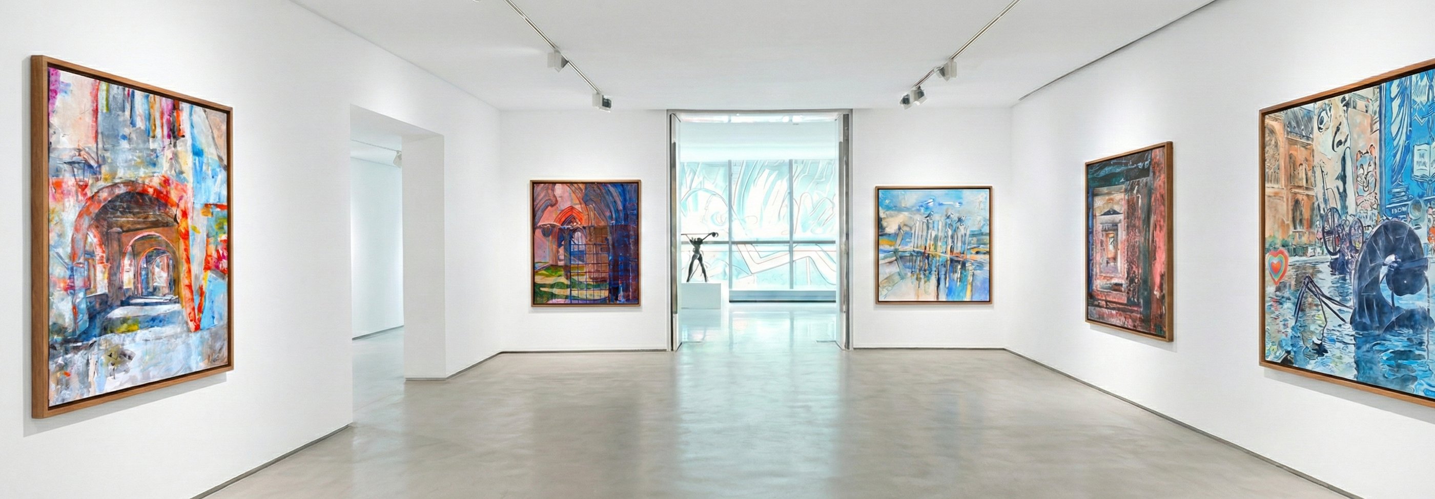 Modern white art gallery displaying colorful framed abstract paintings by Coby Hurtak.