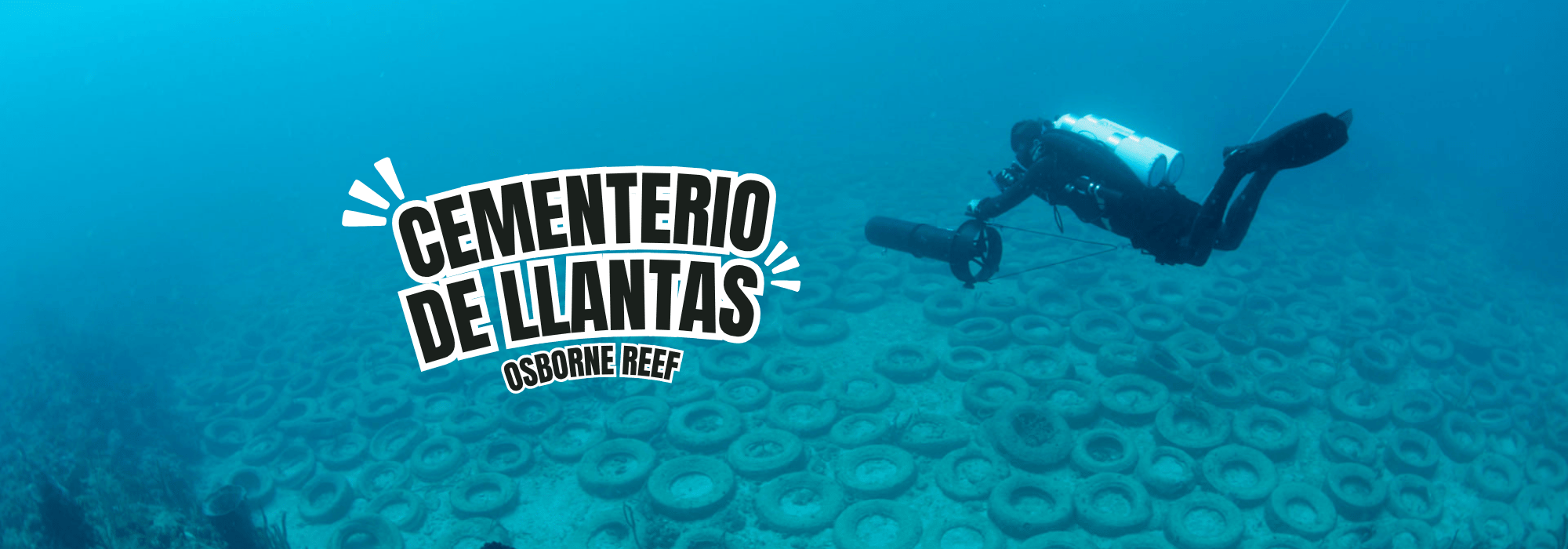 IMAGEN DE BUZO REVISANDO MUCHAS LLANTA EN EL FONDO DEL MAR