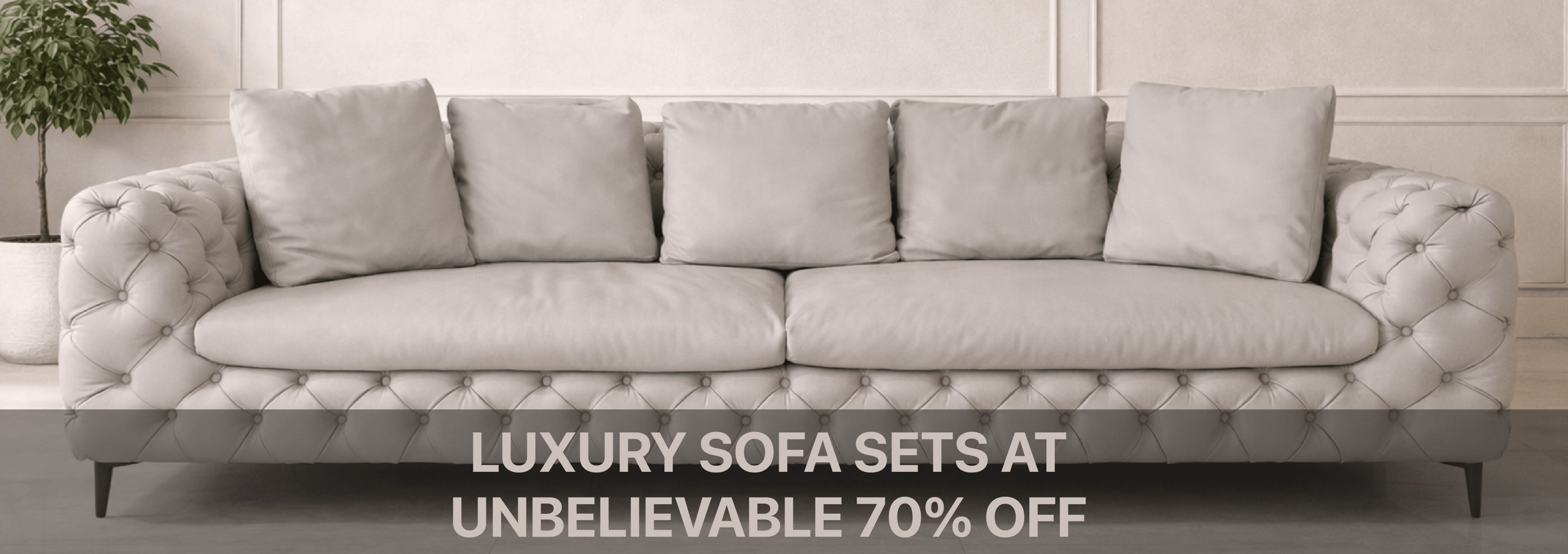 Luxury beige tufted leather sofa set with plush cushions in a modern minimalist living room.