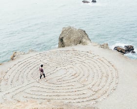 a man walking through a maze