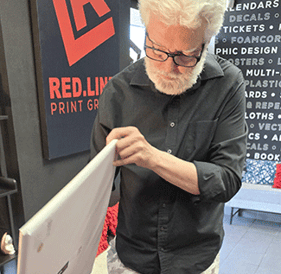 the artist picking up finished prints at Redline Print Group Las Vegas