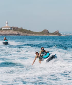 Couple enjoying jet ski ride in northern Mallorca