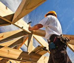 a construction worker is working on a roof truss truss truss truss truss truss truss truss