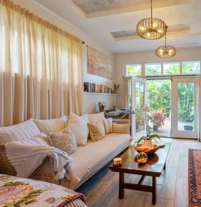 a beautifully decorated living room with a couch and a table
