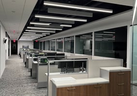 A large modern room filled with offices