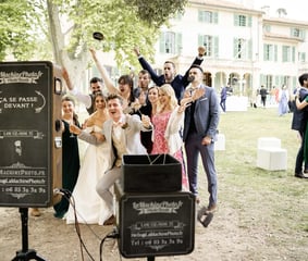 Wedding guests enjoying elegant photobooth during Provence wedding