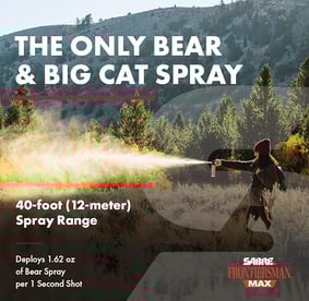 Woman using Frontiersman Bear Spray.