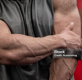 a man with a large arm and arm muscles