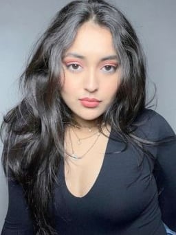 Divorcee escort Megha relaxing in a luxury apartment in Gurugram