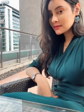 Full service escort Nisha in red lingerie at MG Road hotel in Gurugram