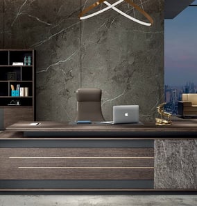 Executive office setup from the Mocardi Series featuring a modern dark wood desk with gold accents,