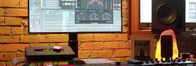 a dj mixing music in a recording studio