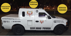 a service truck with a service truck parked in front of it