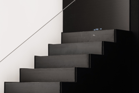 Stairs leading to success - A symbolic representation of progression and growth in the business.