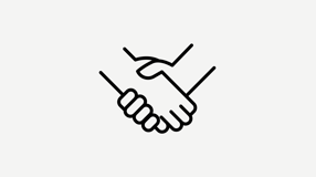A handshake in front of a white background
